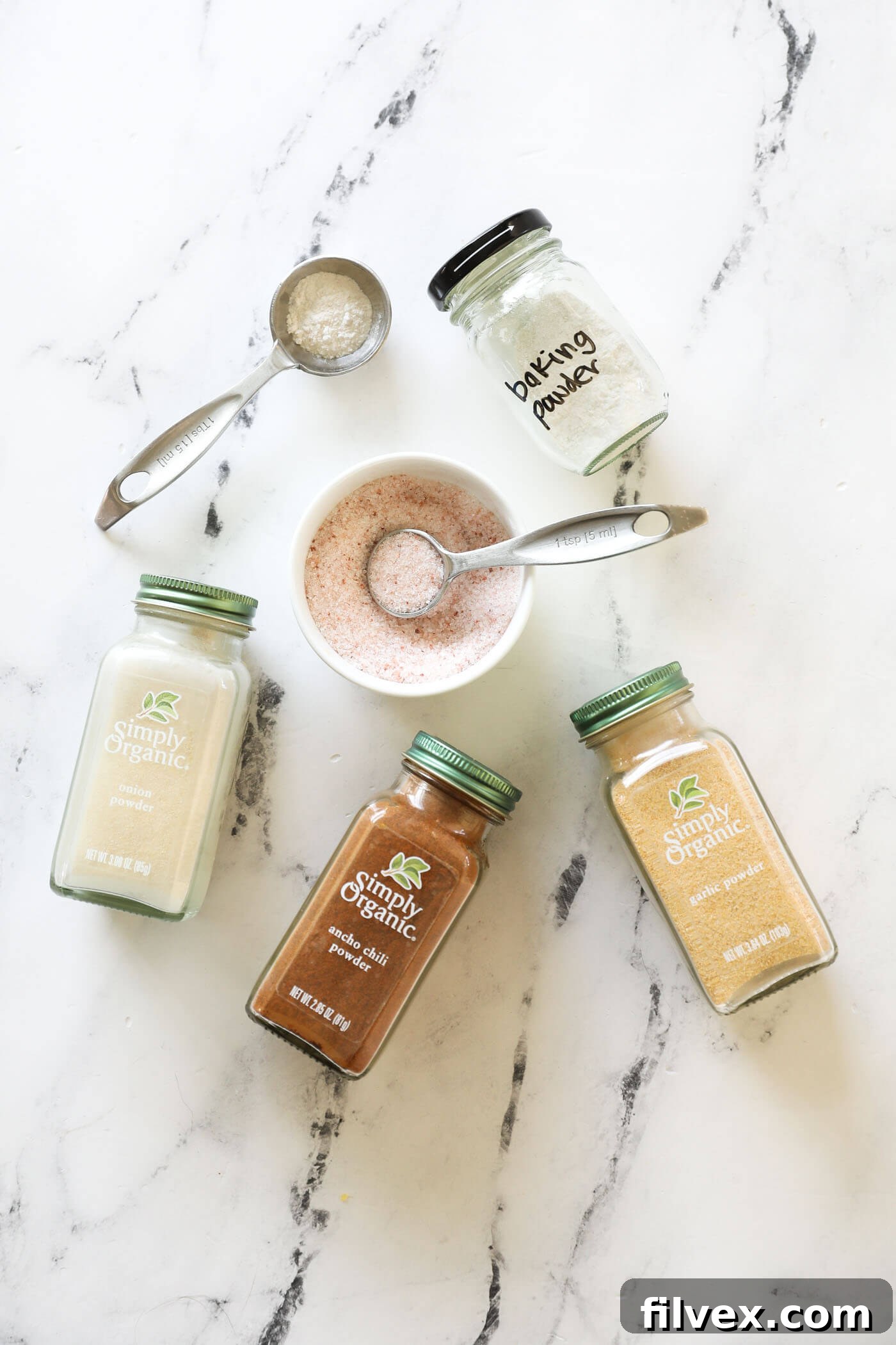 Preheat your Traeger (or pellet grill) to 225° Fahrenheit and mix up the 5-ingredient seasoning mix.