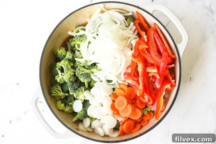 Chopped stir fry veggies in a skillet