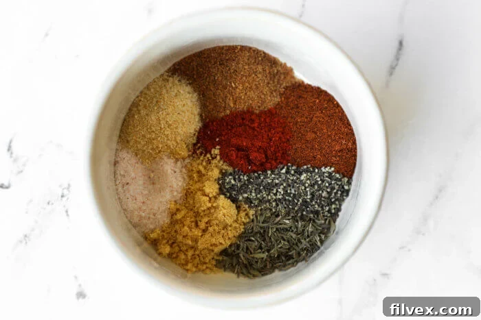 Pork chop seasoning in a ramekin with seasoning separated out