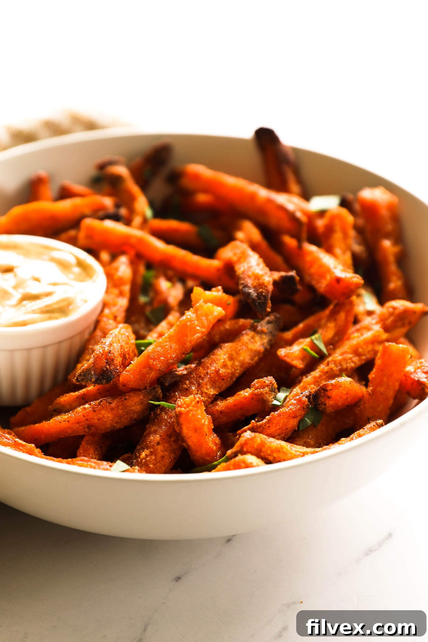 Close-up of frozen sweet potato fries ready to be air-fried to perfection