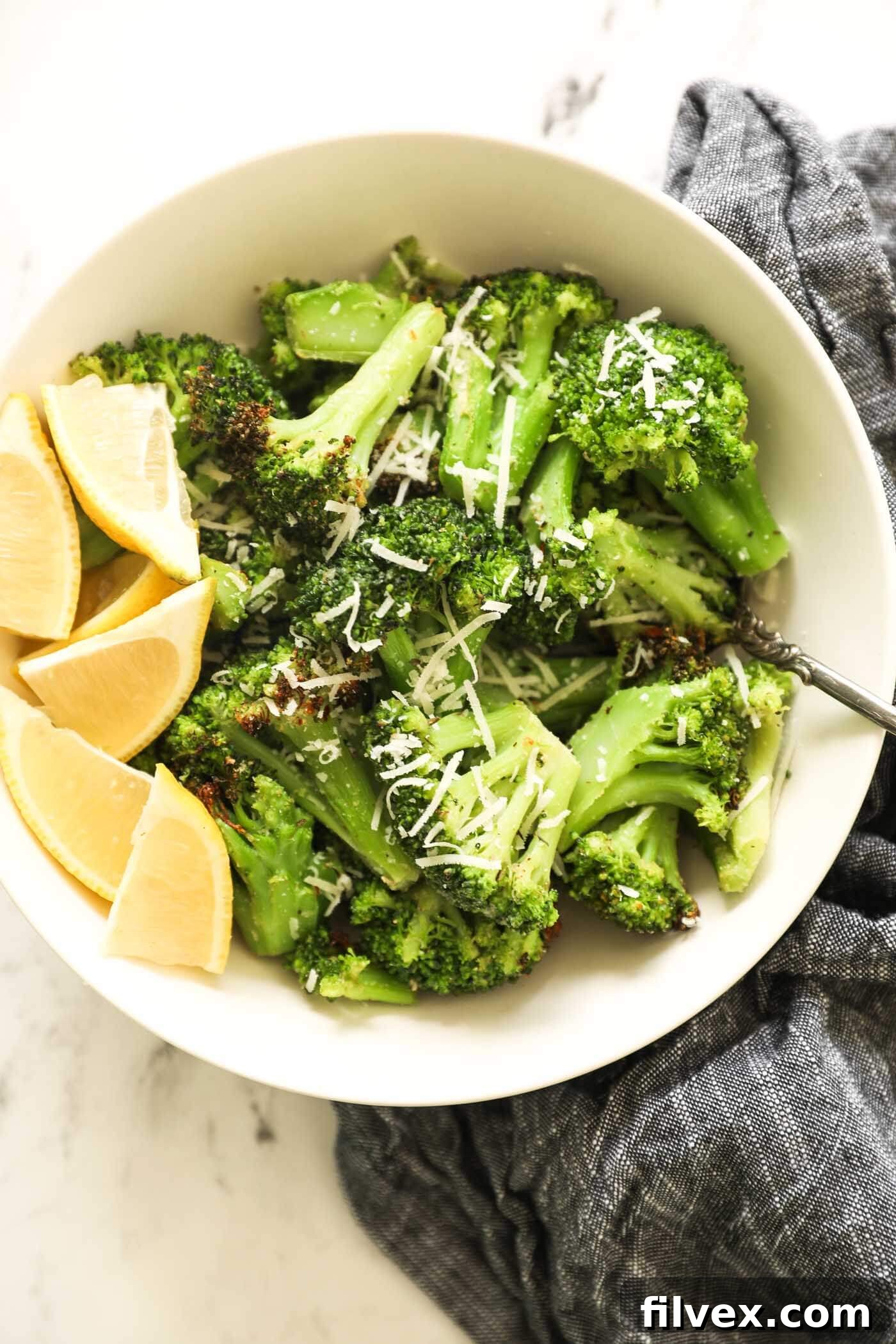 Air-fried frozen broccoli served in a rustic bowl, with a fork, ready to be enjoyed.