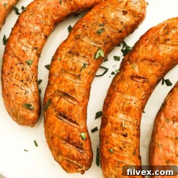 Close up overhead image of sausage links with grill marks