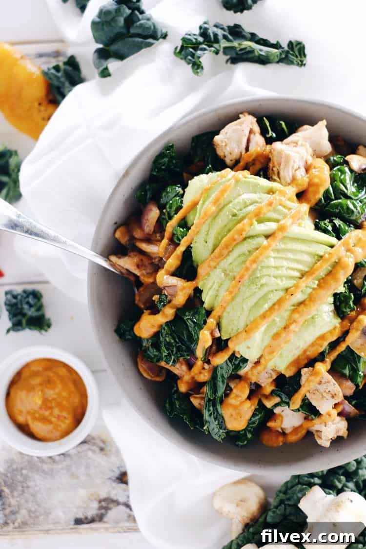 This paleo chicken bowl features the most delicious roasted red pepper sauce. Clean and Whole30 compliant with only eight ingredients, it can be prepared in under 30 minutes. Paleo, Whole30, Gluten-Free + Dairy-Free. | realsimplegood.com