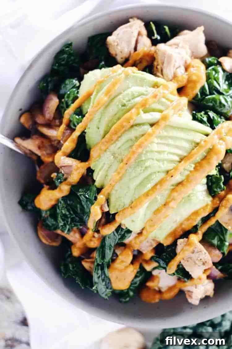 This paleo chicken bowl is incredibly versatile, fitting for anyone. It features a delicious roasted red pepper sauce. Clean and Whole30 with only eight ingredients, you can prepare it in under 30 minutes. Paleo, Whole30, Gluten-Free + Dairy-Free. | realsimplegood.com