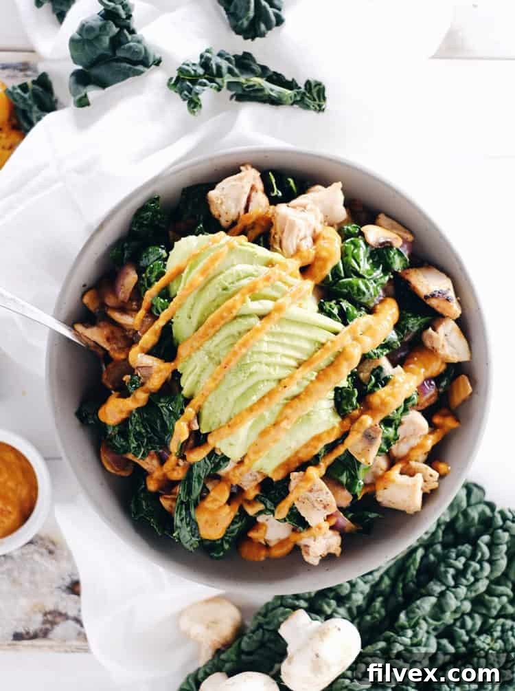 This paleo chicken bowl is incredibly easy to make, even for beginners. It features a delicious roasted red pepper sauce. Clean and Whole30 with only eight ingredients, you can prepare it in under 30 minutes. Paleo, Whole30, Gluten-Free + Dairy-Free. | realsimplegood.com