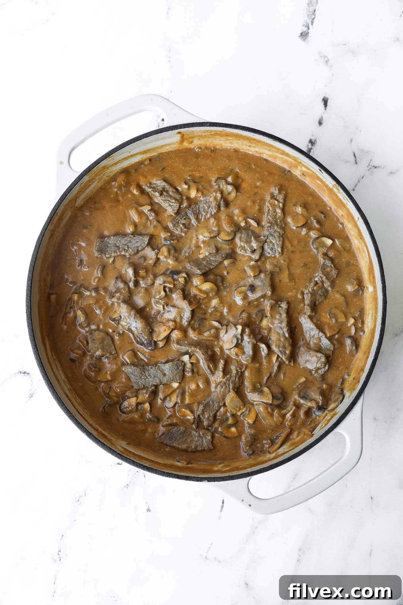 The finished creamy beef and mushroom skillet, perfectly mixed and ready to be served immediately.