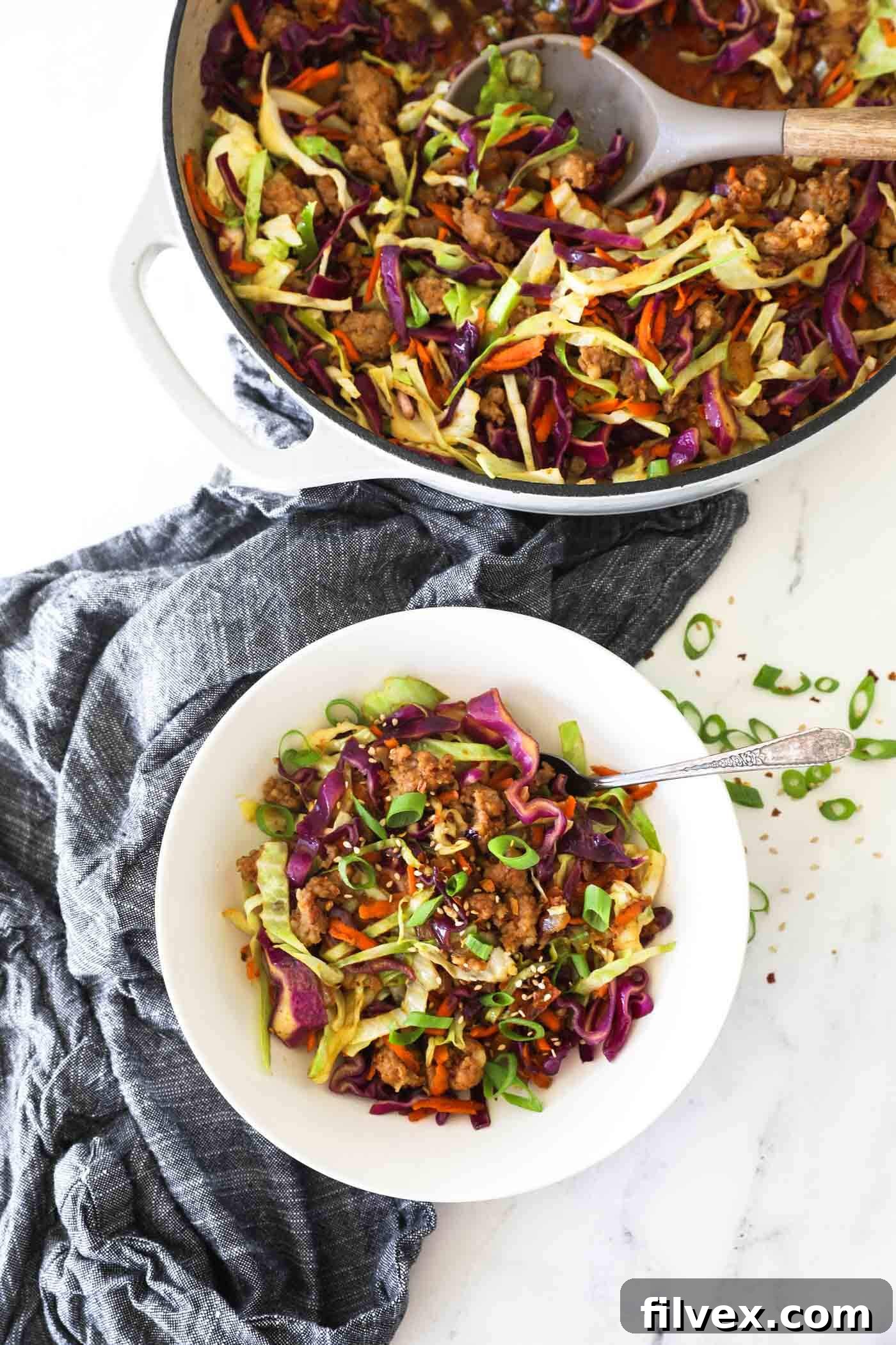 A close-up shot of the finished ground pork and cabbage skillet, showing the tender vegetables and browned pork.
