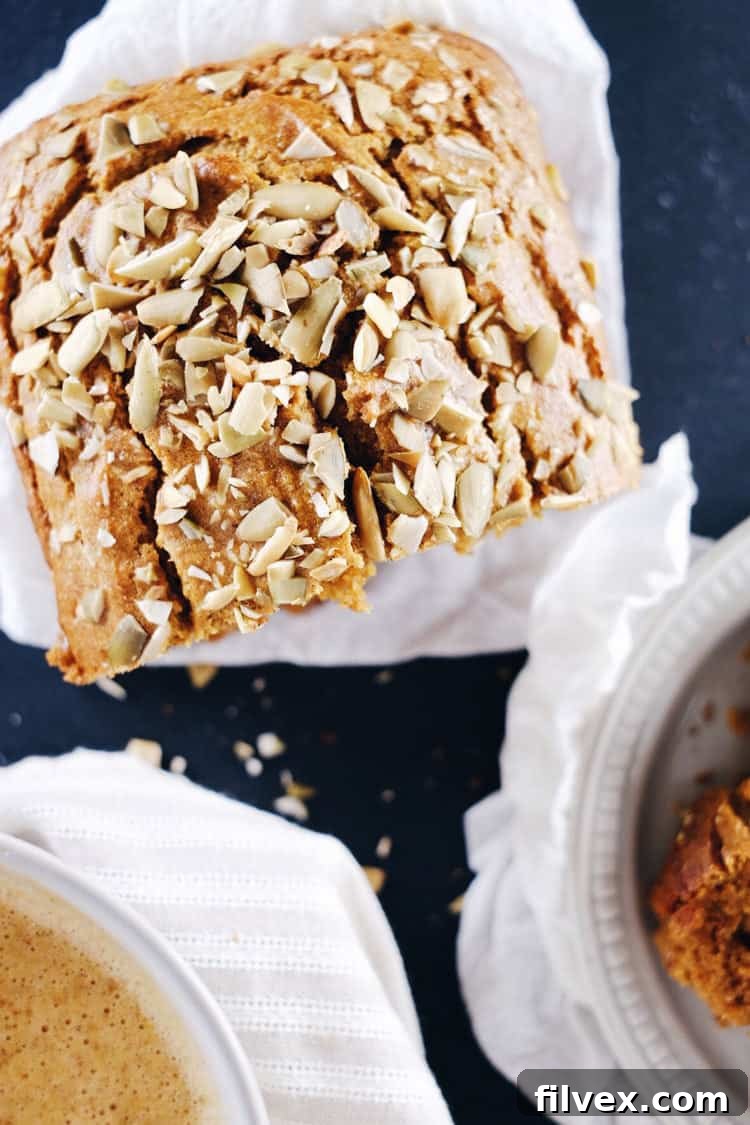 Cozy fall flavors in this healthy Paleo pumpkin bread recipe, gluten-free, nut-free, dairy-free. | realsimplegood.com