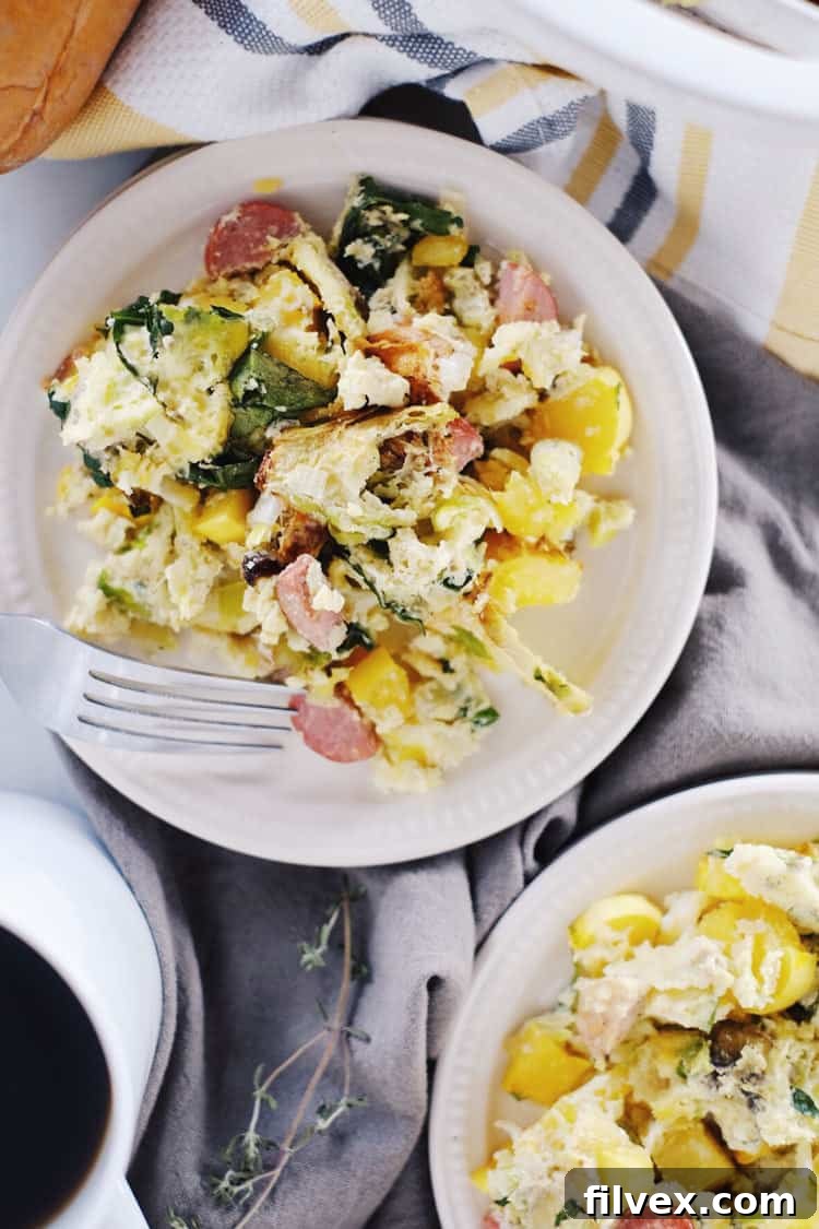 Our Paleo + Whole30 autumn breakfast casserole is full of fall flavors with kale, brussels sprouts, mushrooms, winter squash, leeks, eggs and sausage. Paleo, Whole30, Gluten-Free + Dairy-Free. | realsimplegood.com