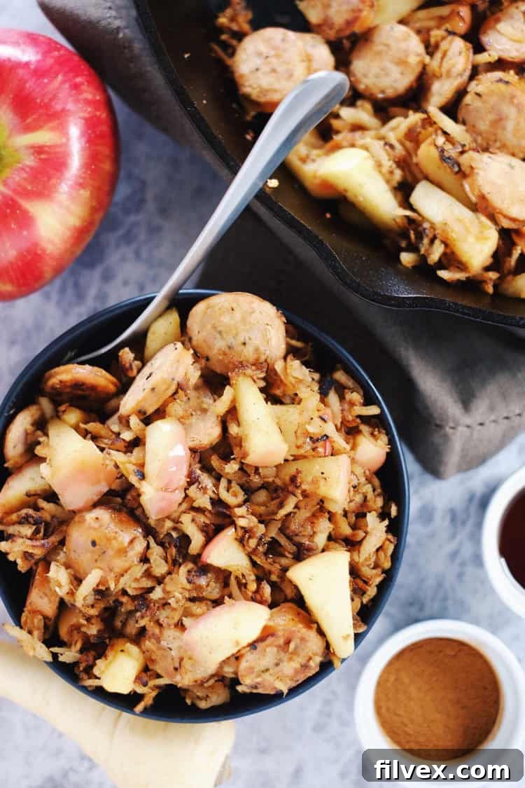 This egg-free parsnip breakfast hash is the perfect savory-sweet way to start your day with parsnips, sausage and apples. Paleo + Gluten-Free. | realsimplegood.com