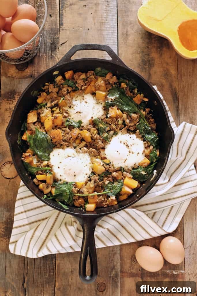 Paleo Butternut Squash Breakfast Hash served in a skillet