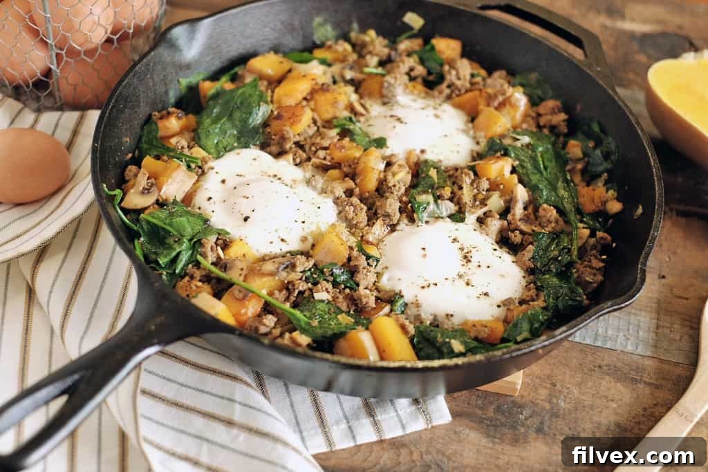 Close-up of Paleo Butternut Squash Breakfast Hash with eggs