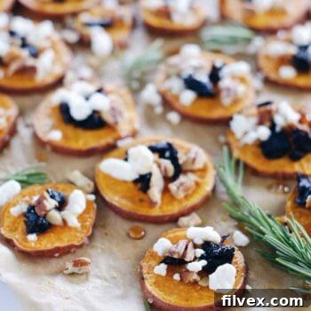 Close-up of roasted sweet potato bites with toppings.