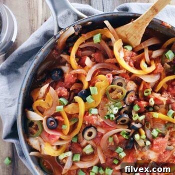 Veracruz fish skillet with peppers and tomato sauce, ready to be enjoyed as a healthy meal.