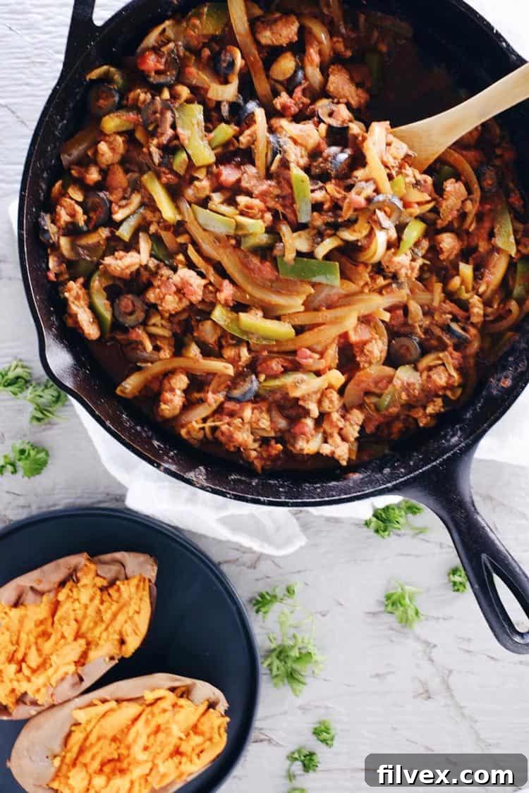 These pizza stuffed sweet potatoes are an easy way to get all the pizza flavors you crave in a Paleo + Whole30 compliant recipe! The dairy is completely optional. Paleo, Whole30 +Gluten-Free. | realsimplegood.com