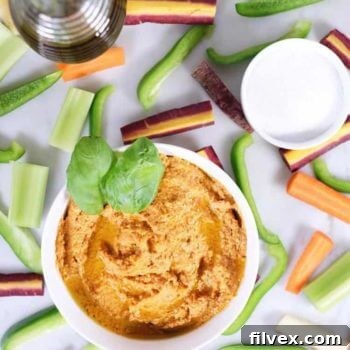 Freshly made Garlic Basil Nut Hummus, a delicious Paleo, Whole30, and Keto-friendly dip.