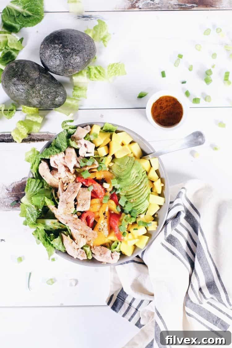 Close-up of a serving of chili lime chicken salad, showcasing the colorful ingredients.
